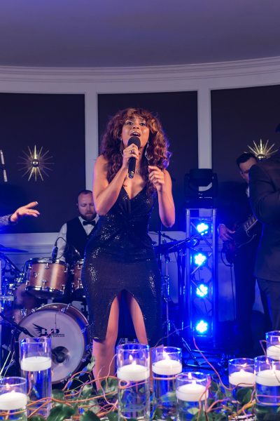 Should you hire a wedding band or a DJ?